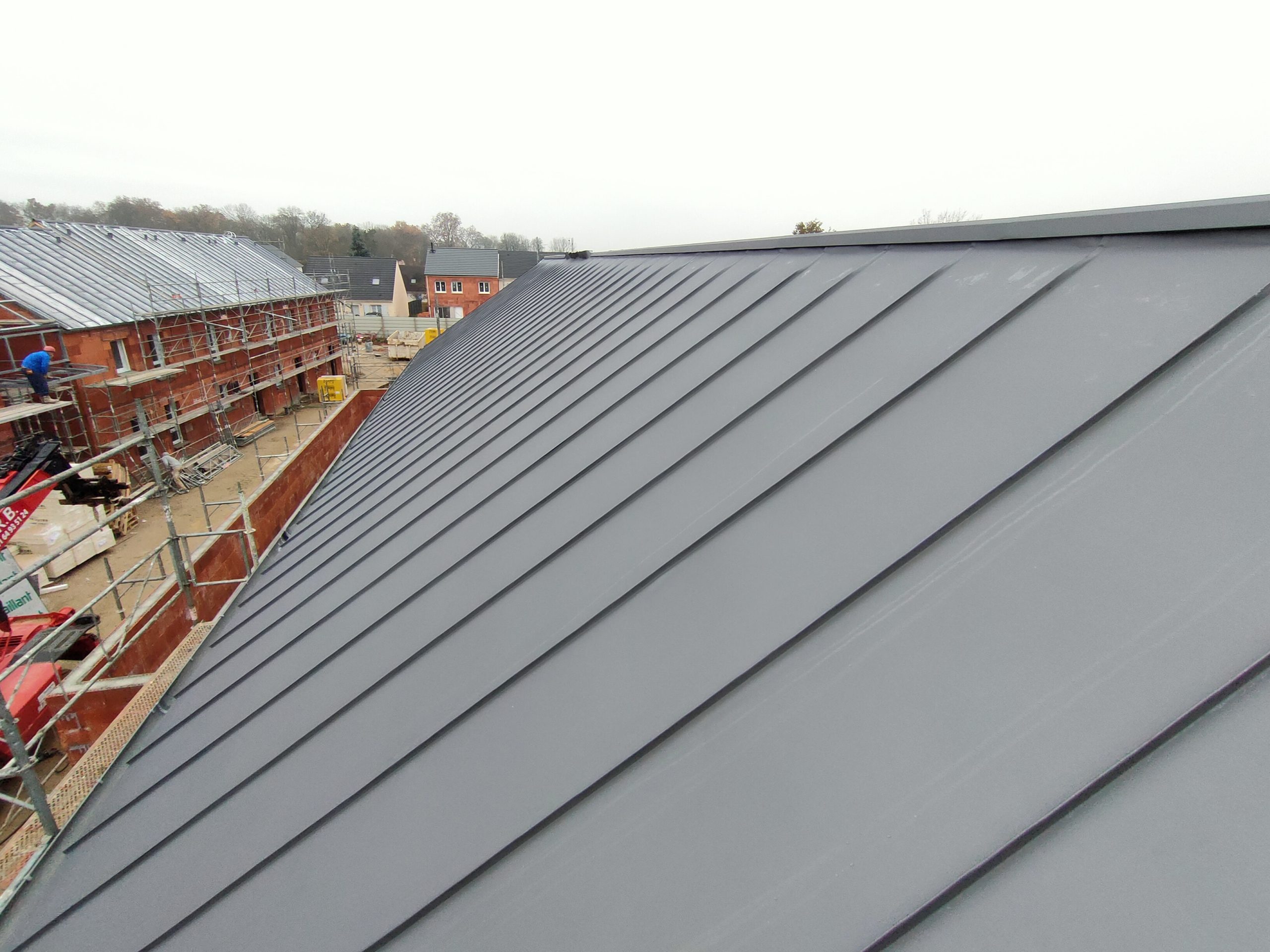 Réalisation Onuta 11 - Travaux de couverture, charpente ou extension de maison en Essonne