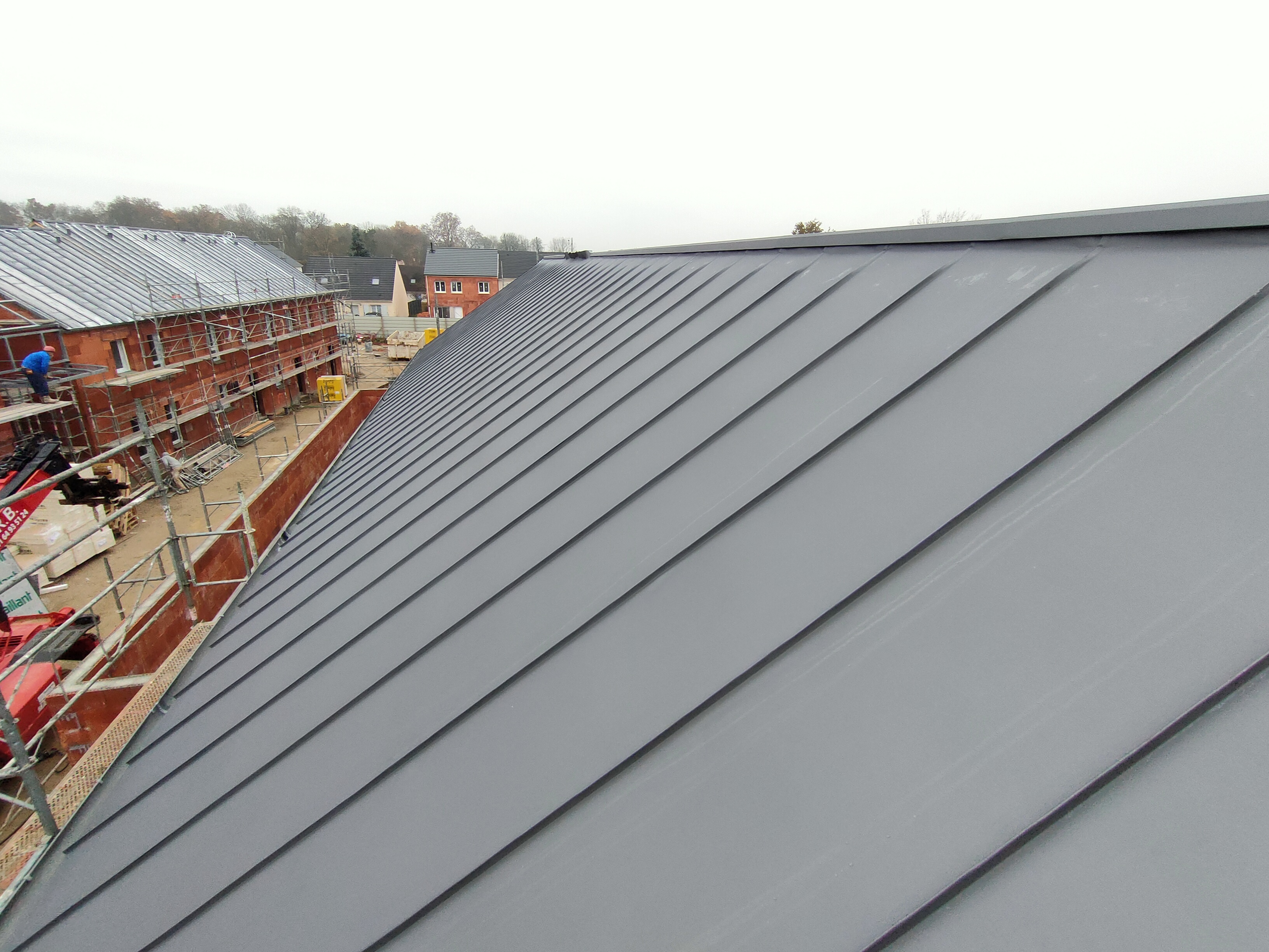 Réalisation Onuta 12 - Travaux de couverture, charpente ou extension de maison en Essonne