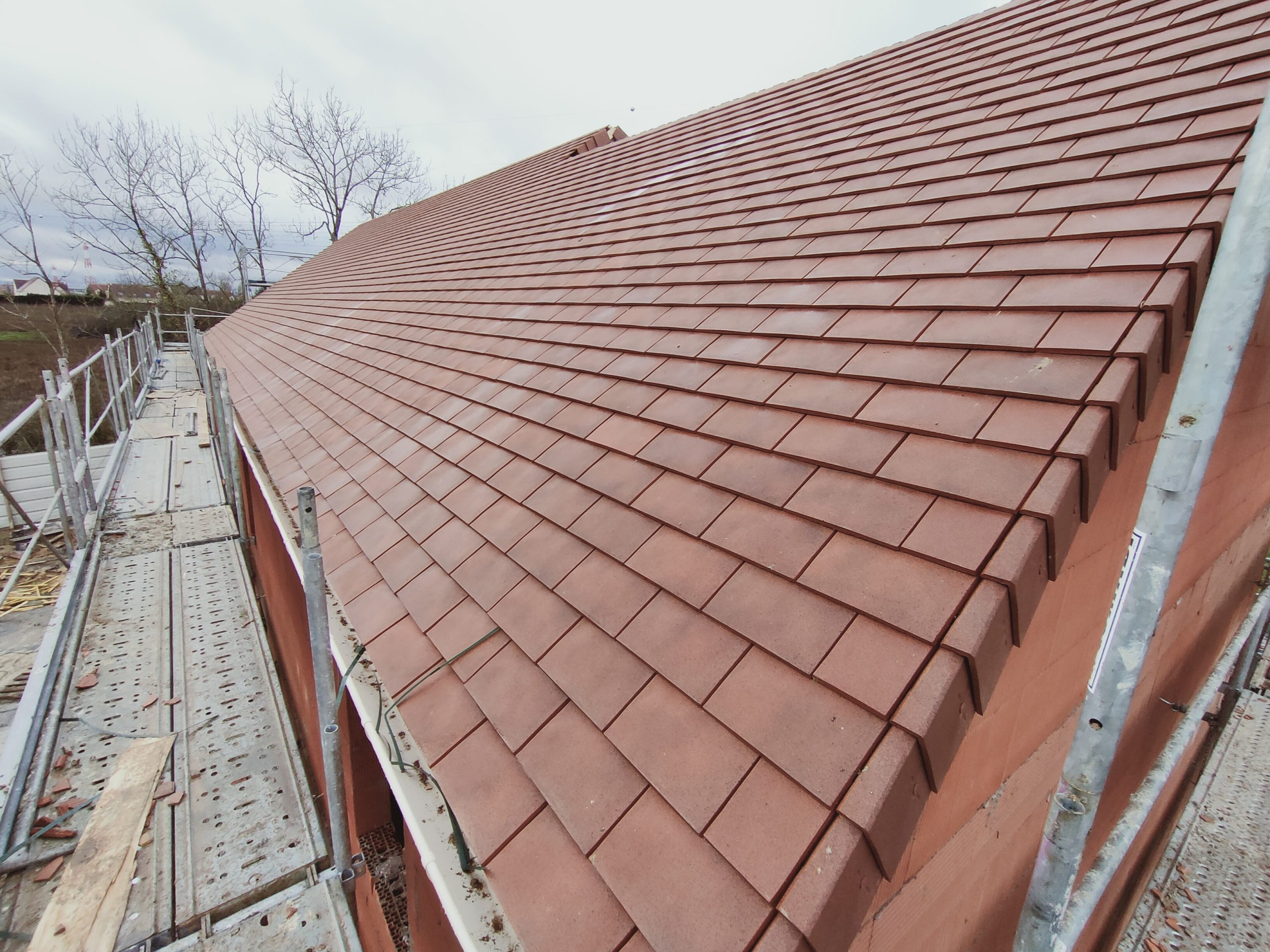 Réalisation Onuta 15 - Travaux de couverture, charpente ou extension de maison en Essonne